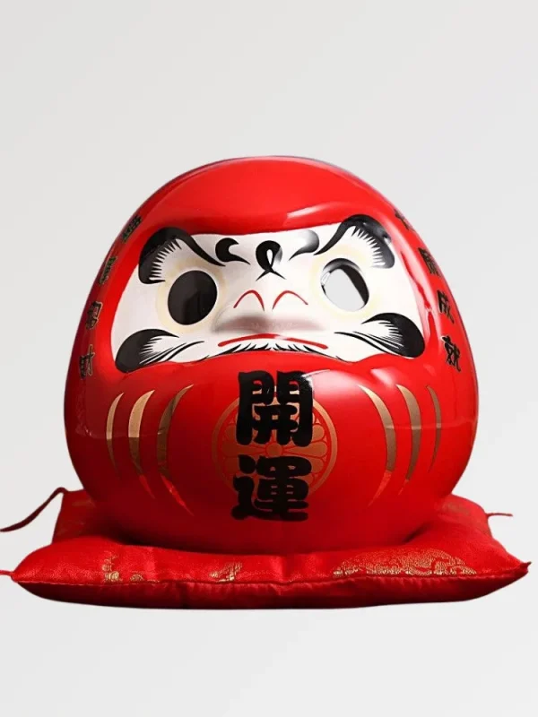 hucha gigante Daruma en color burdeos