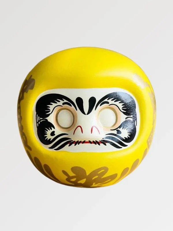 alcancía amarilla daruma