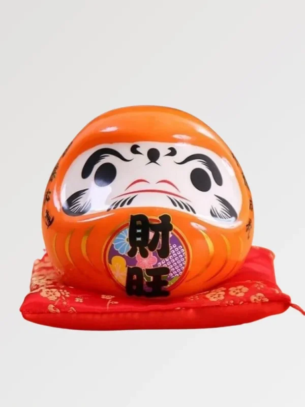 alcancía Daruma color naranja