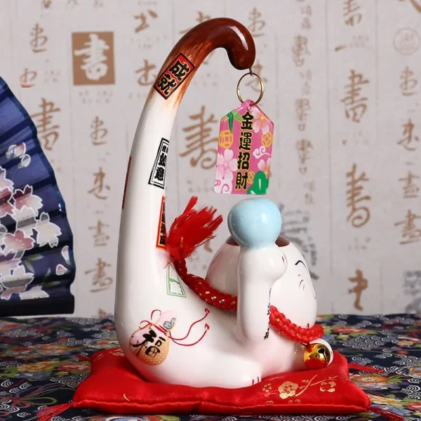 amuleto de la suerte japonés Maneki Neko