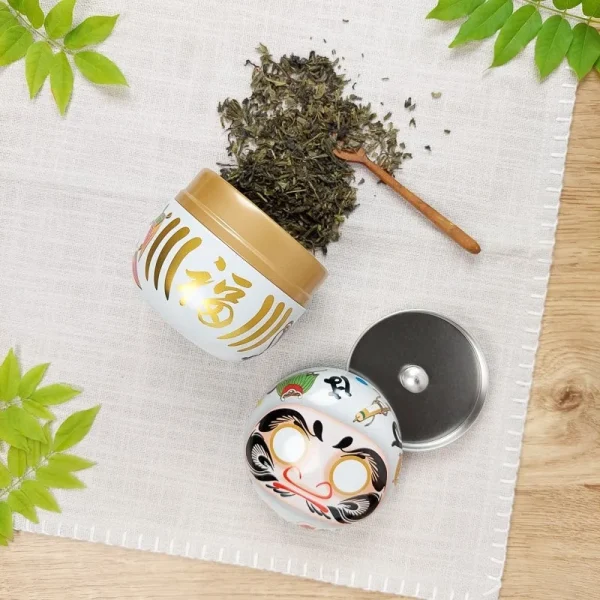 té en caja de metal Daruma blanco