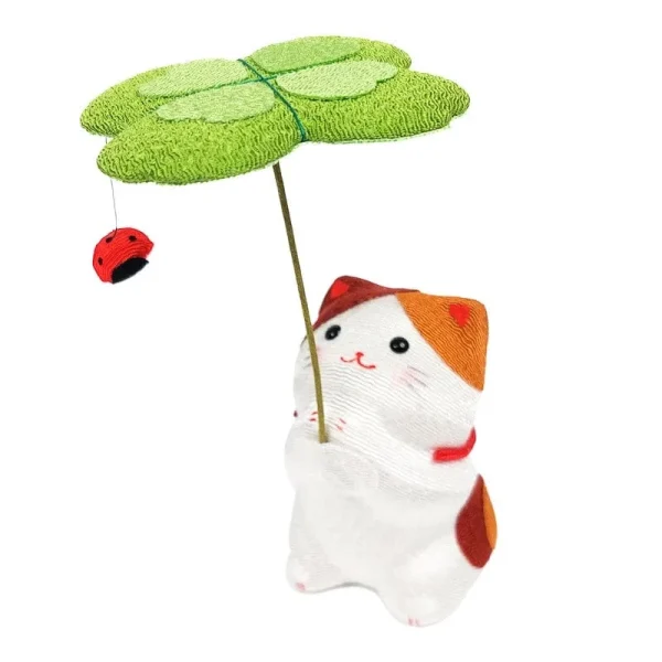 escultura de gato trébol japonés