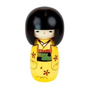 Muñeca Kokeshi de color amarillo